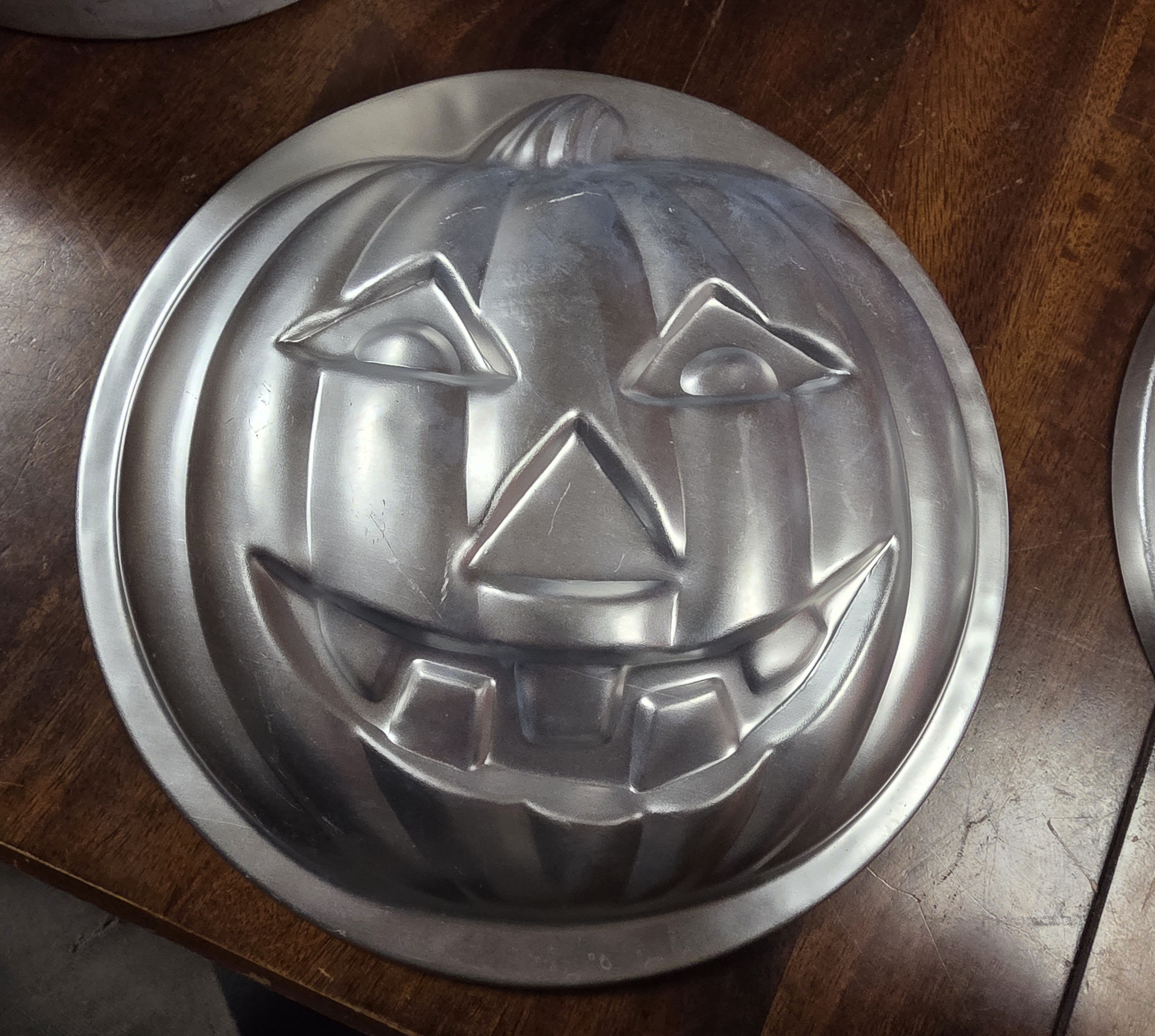 Wilton Holiday-Themed Cake Pans (Pumpkin, Santa, Umbrella) - label