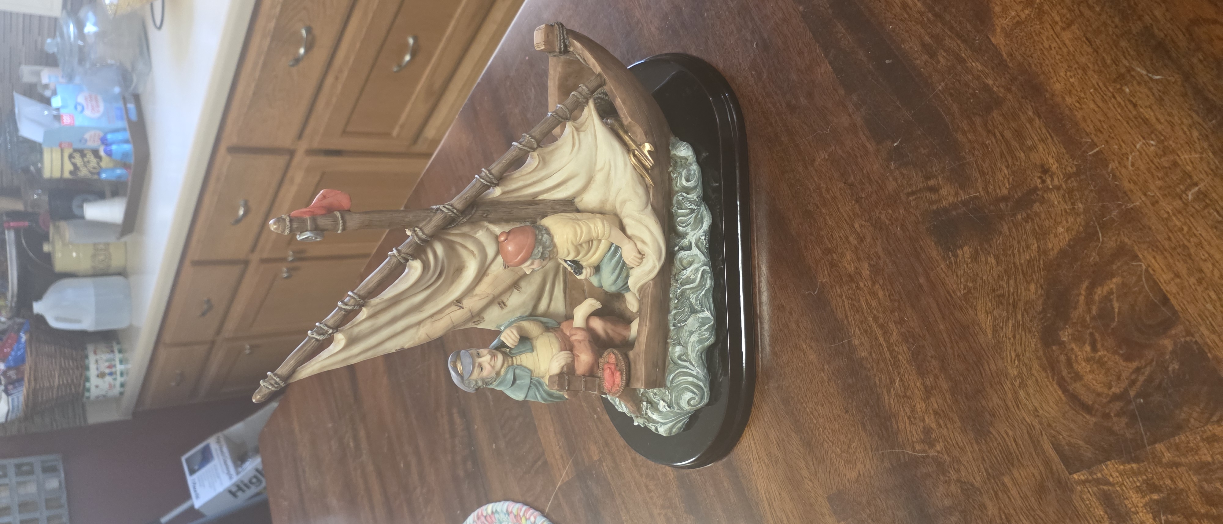 Sailboat with Sailor Figurines Sculpture